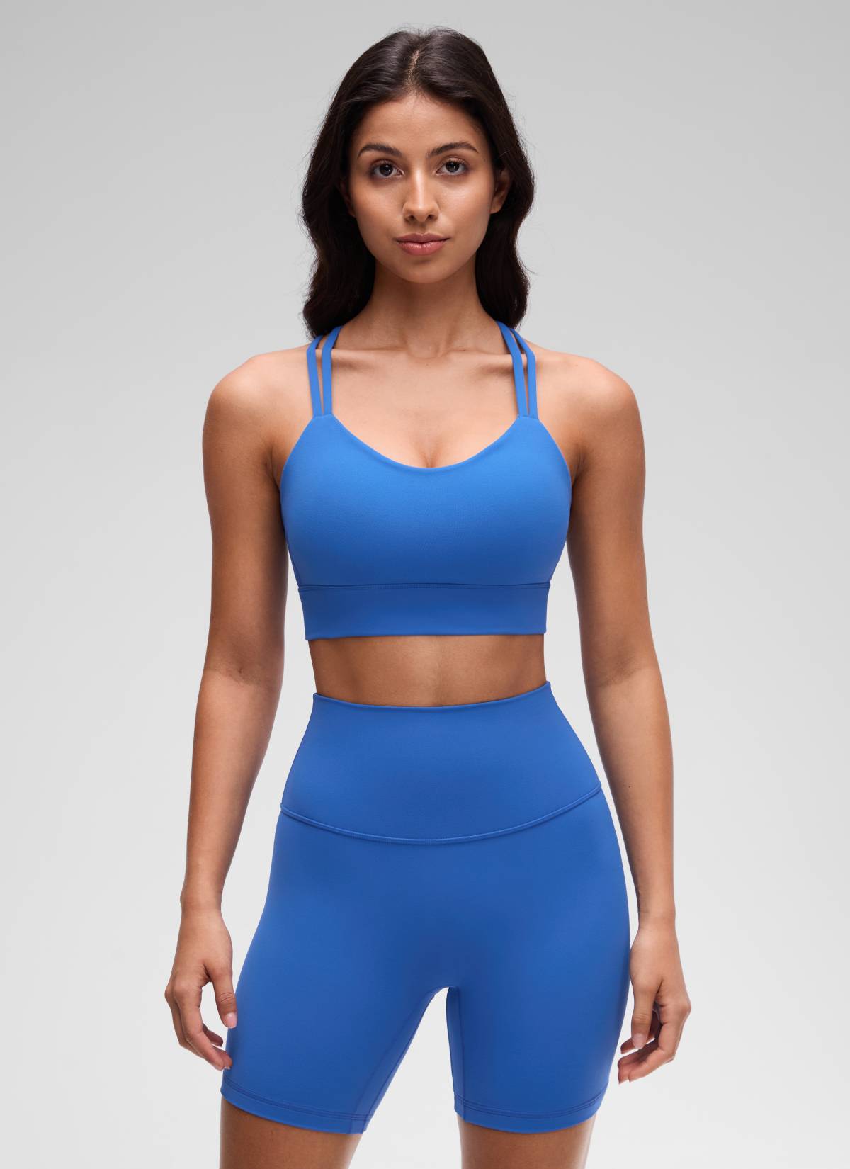 CRZ YOGA Womens Butterluxe Strappy Longline Criss Cross Molded Cup Bra Sparkle Blue @model_info:Maysa