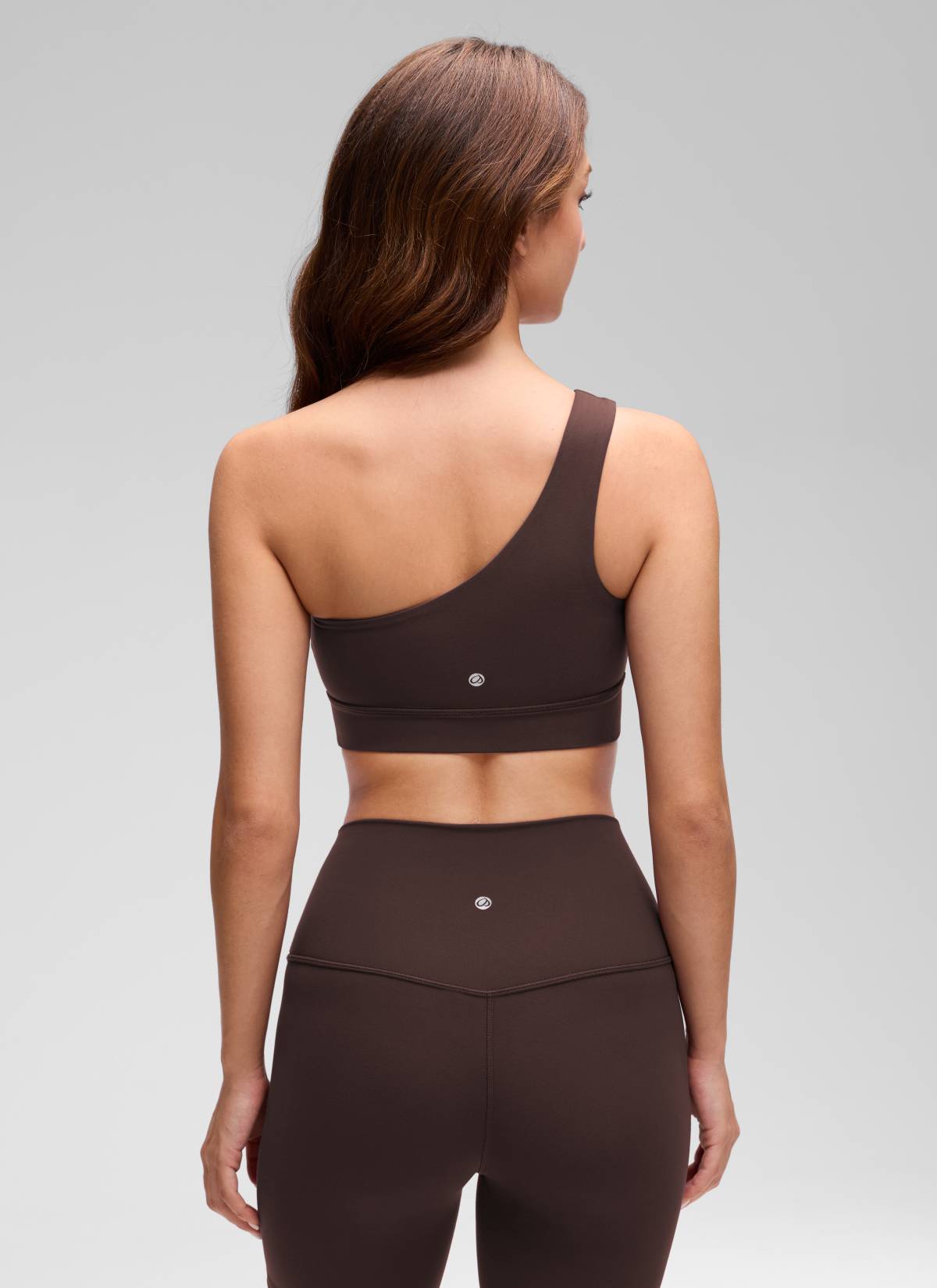 CRZ YOGA Butterluxe Womens One Shoulder Sports Bra Asymmetrical Padded Hot Fudge Brown @model_info:Inga