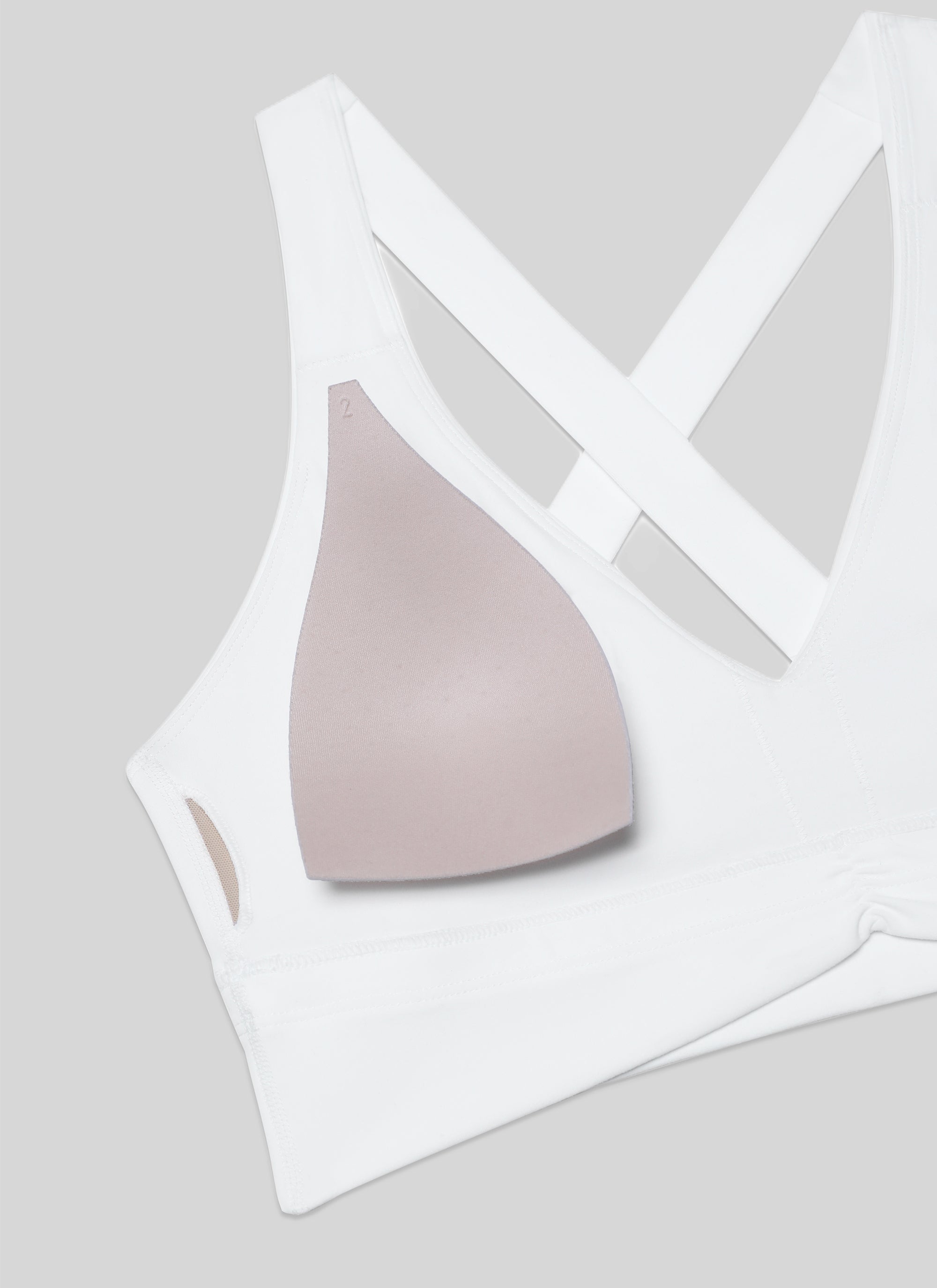 Sujetador de yoga de sujeción ligera con cuello en V y fruncido Butterluxe para mujer Blanco