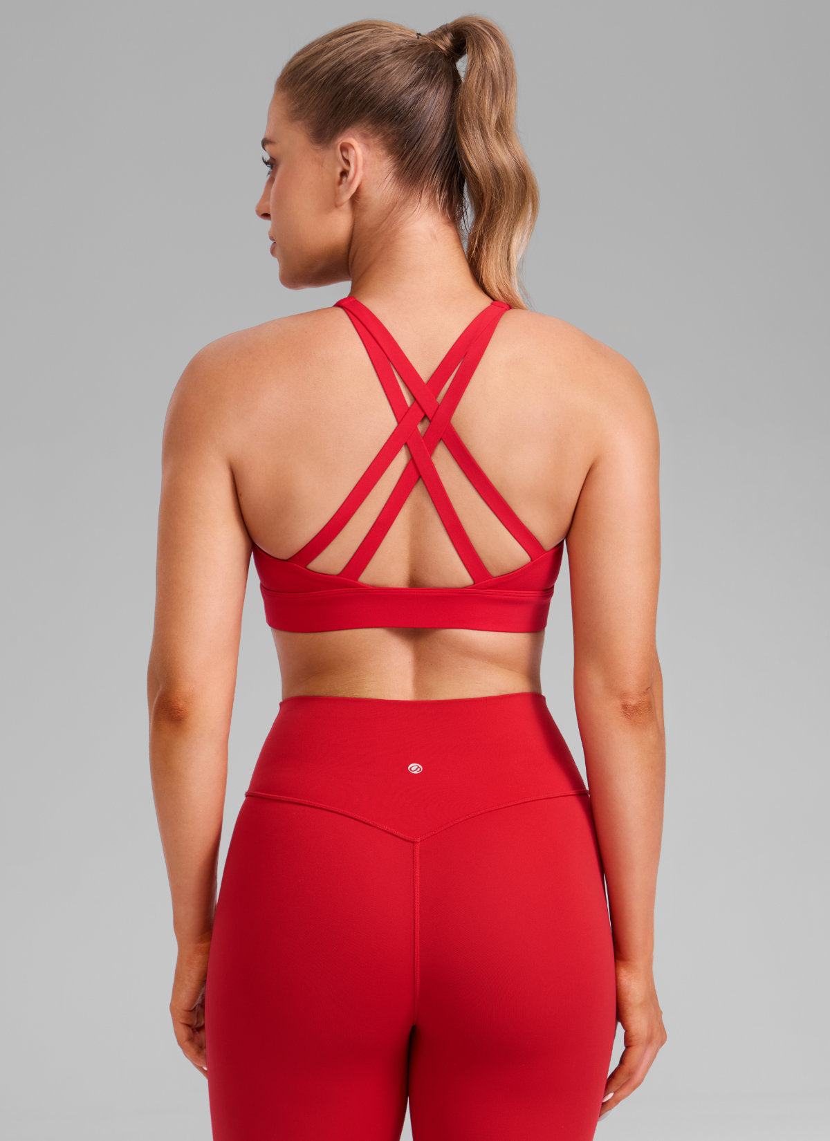CRZ YOGA Дамски спортен сутиен Butterlift® с кръгло деколте и кръстосани презрамки на гърба Aurora Red