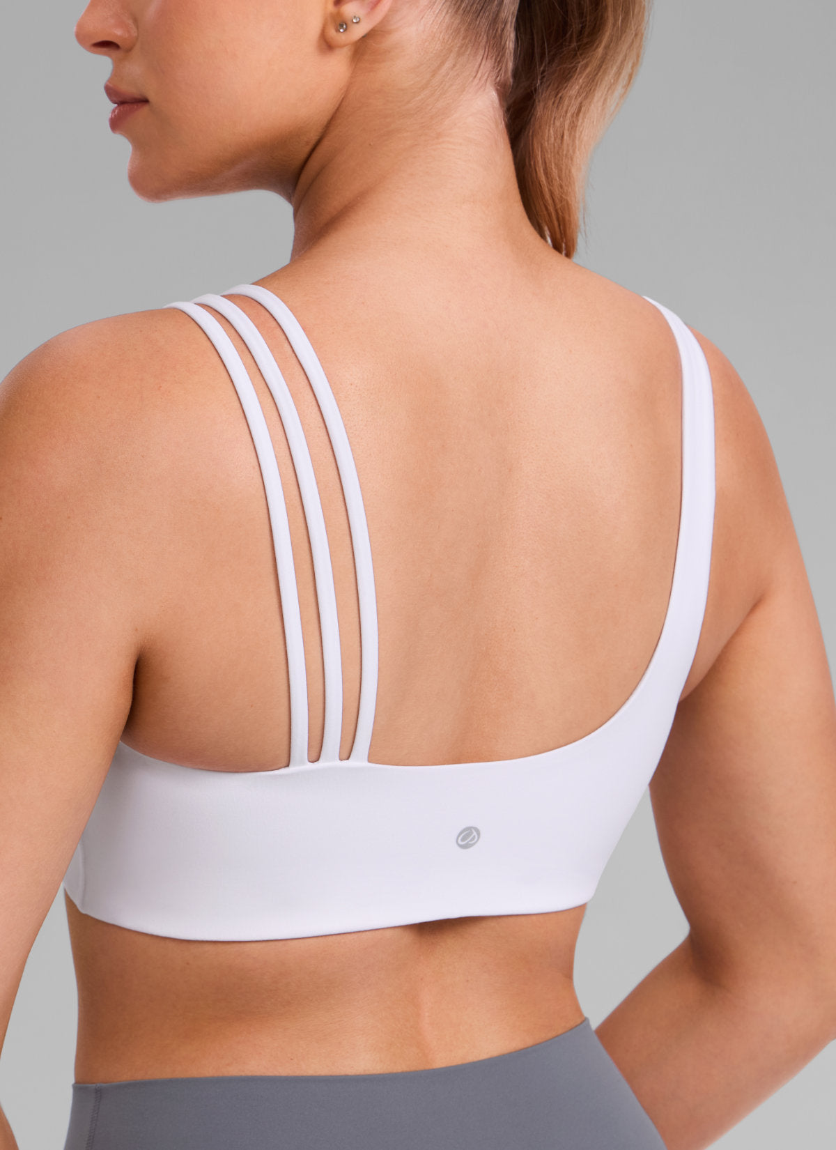 Butterlift® női jóga sportmelltartó, aszimmetrikus pántokkal, közepes tartással, fehér