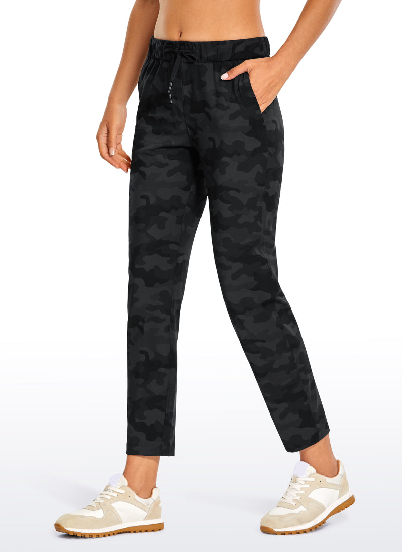 CRZ YOGA Women's Travel Slim Fit Stretch Drawstring 7/8 Pants 27'' Dark grey camouflage @model_info:Lo