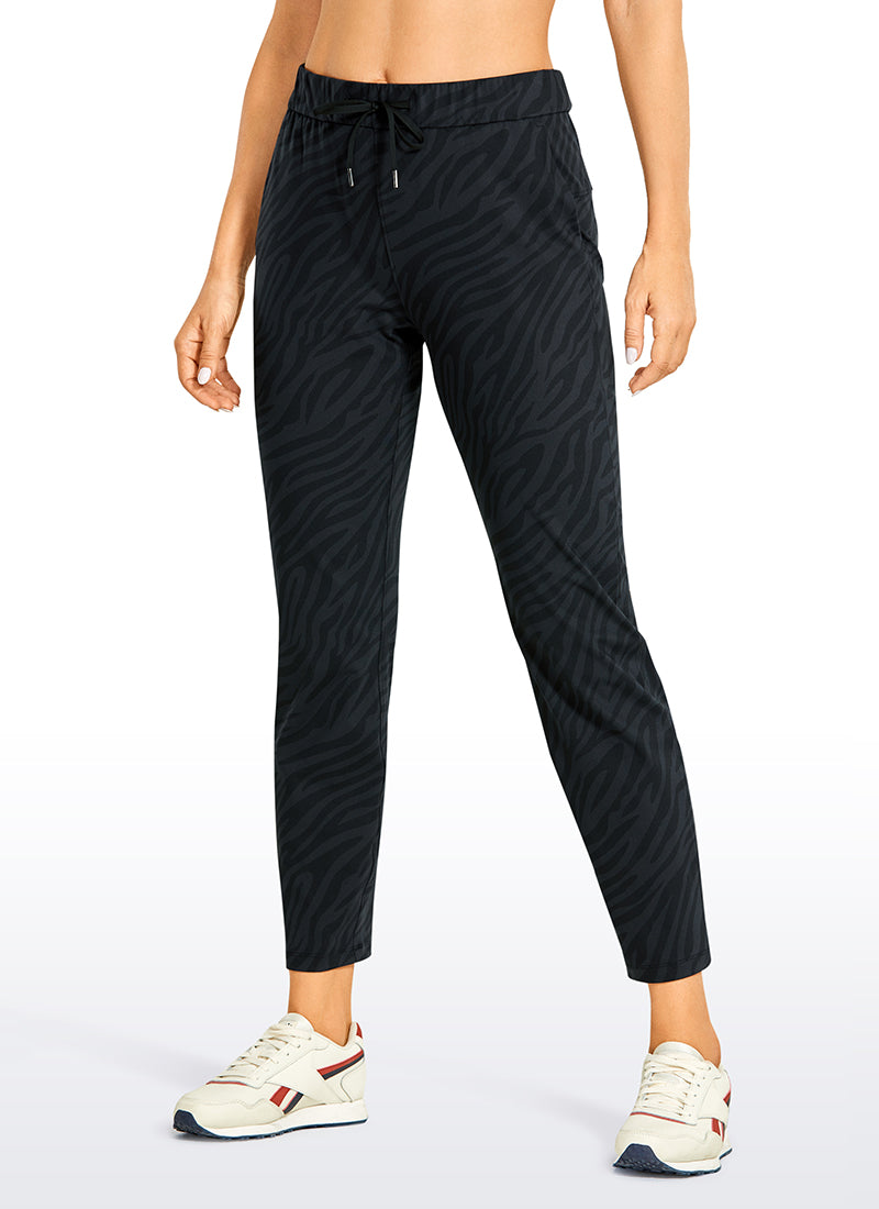 CRZ YOGA Women's Travel Slim Fit Stretch Drawstring 7/8 Pants 27'' Dark Zebra @model_info:N