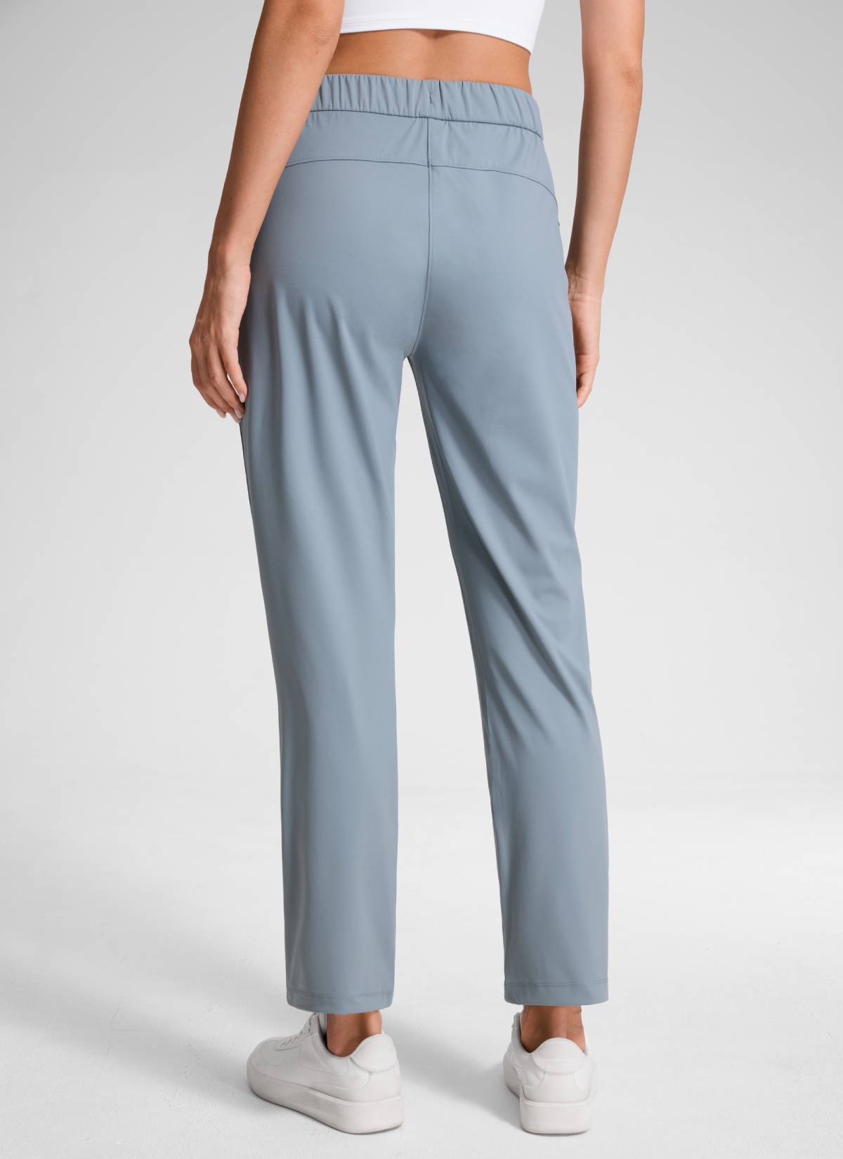 CRZ YOGA Women's Travel Slim Fit Stretch Drawstring 7/8 Pants 27'' Belgian Blue @model_info:Anna