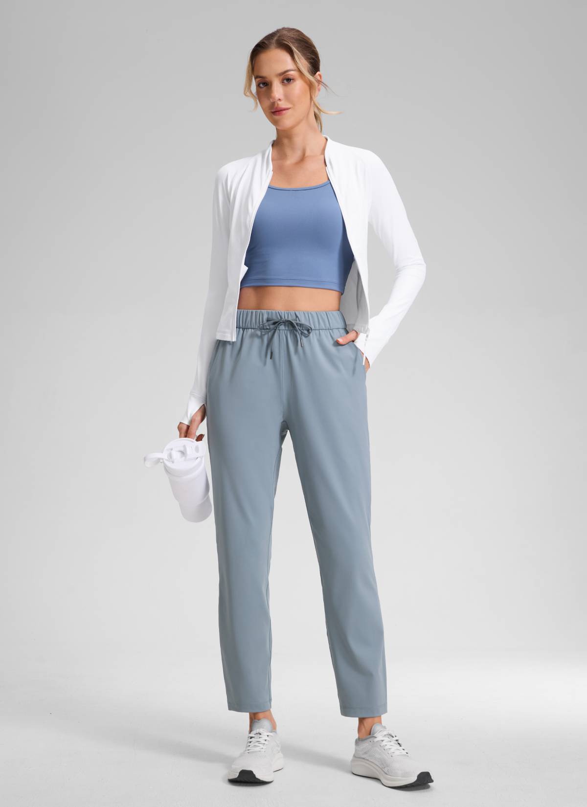 CRZ YOGA Women's Travel Slim Fit Stretch Drawstring 7/8 Pants 27'' Belgian Blue @model_info:Anna