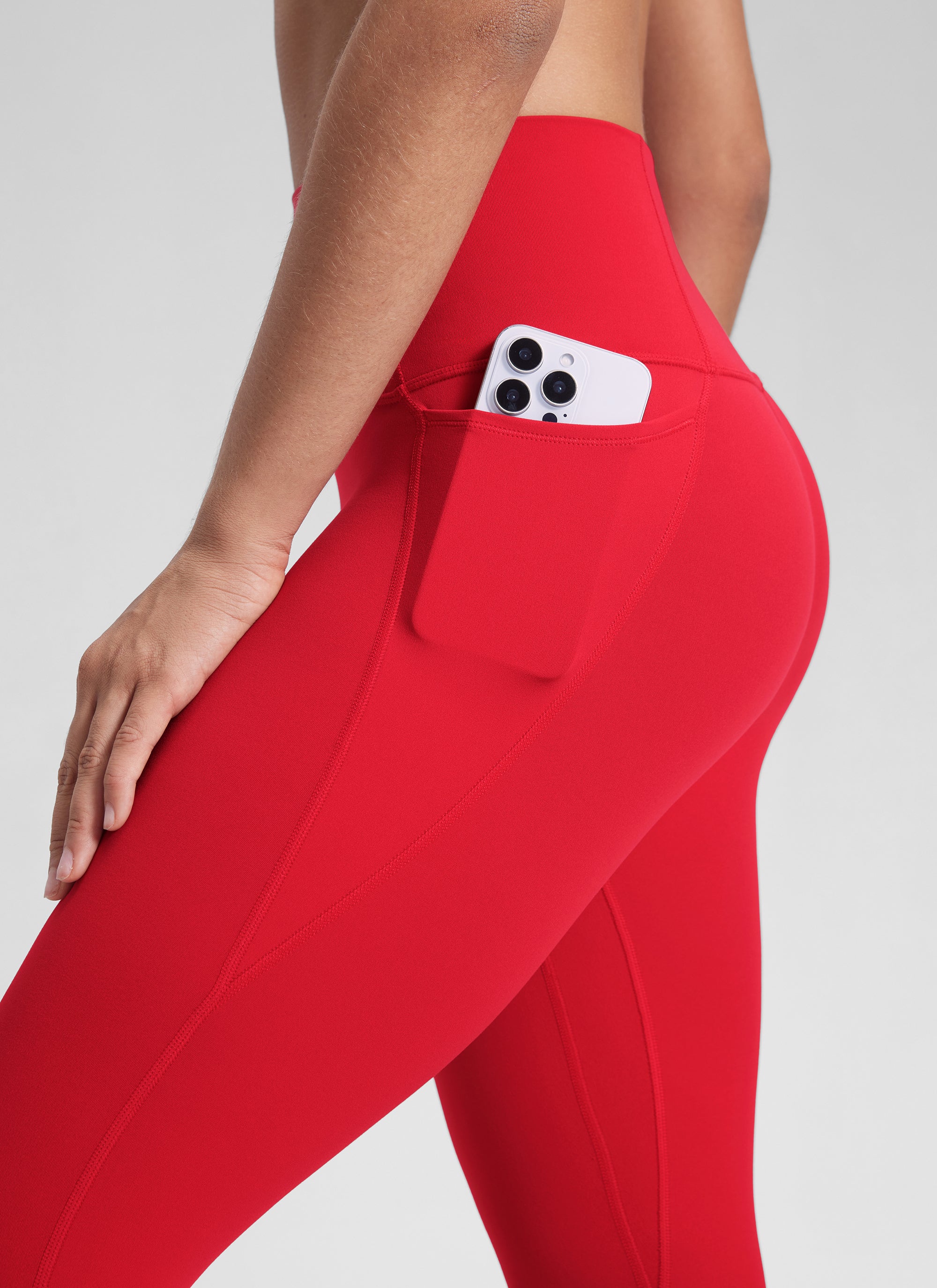 CRZ YOGA Dámske jógové a voľnočasové legíny s vysokým pásom Butterluxe s vreckami 64 cm Aurora Red