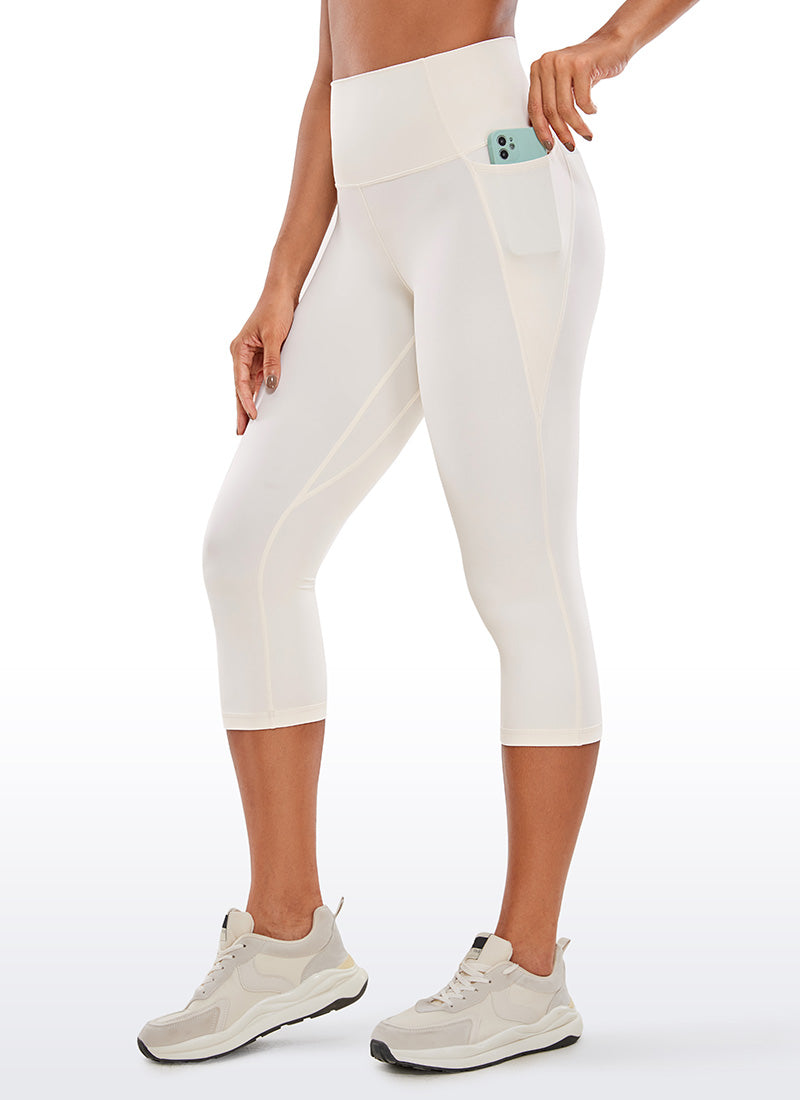 CRZ YOGA Dames Butterluxe High Waist Caprilegging met Zakken 48 cm Wit Abrikoos
