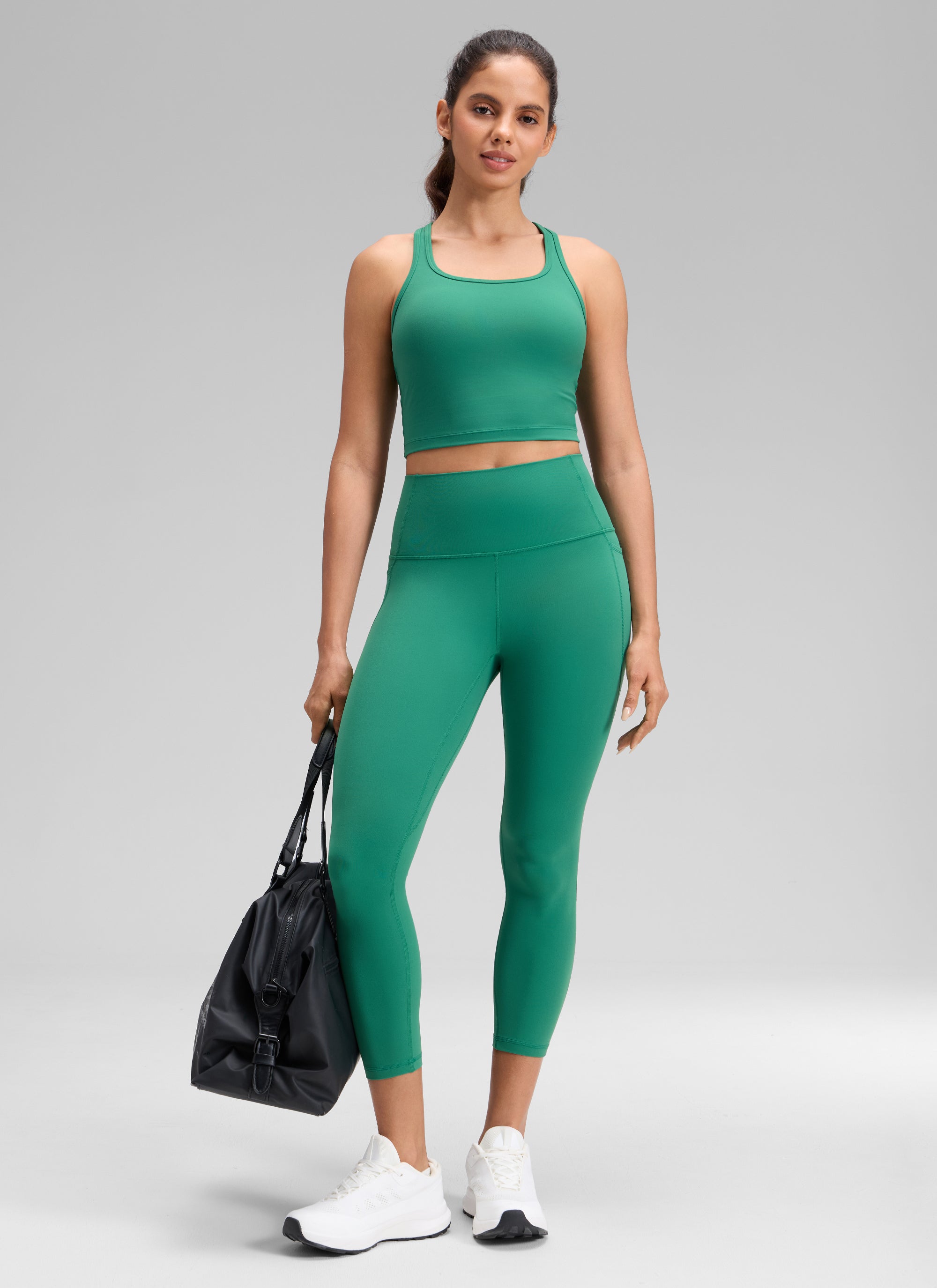 CRZ YOGA Dames Butterluxe Caprilegging met hoge taille en zakken, 58 cm, Cascadia Groen