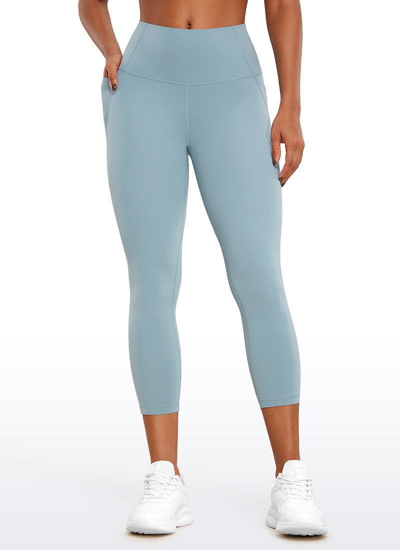 CRZ YOGA Dames Butterluxe High Waist Capri Legging met Zakken 58 cm Lichtgrijsblauw