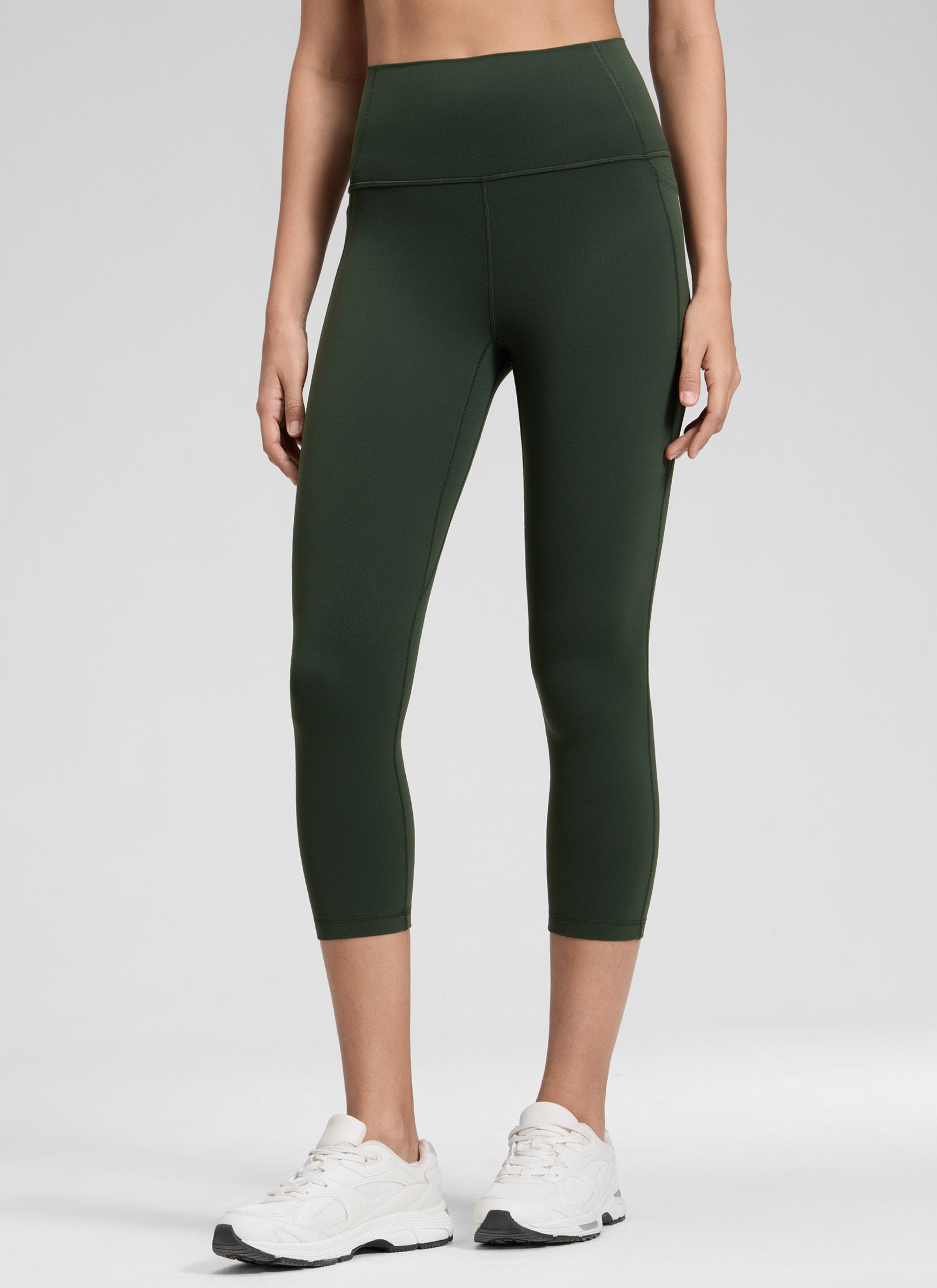 CRZ YOGA Women's Yoga High Rise Butterluxe Capri with Pockets 21'' Legend Green @model_info:Jenna