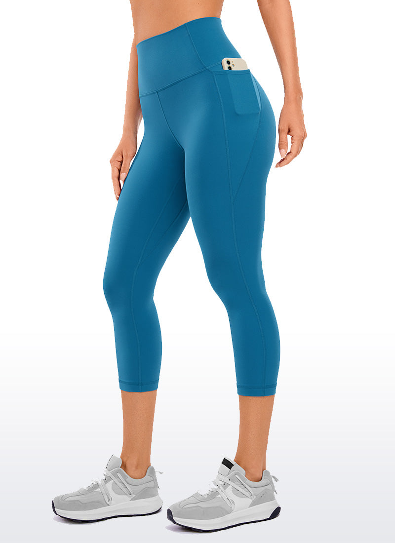 CRZ YOGA Dames Yoga Butterluxe Capri met hoge taille en zakken, 53 cm, Super-sonic blauw