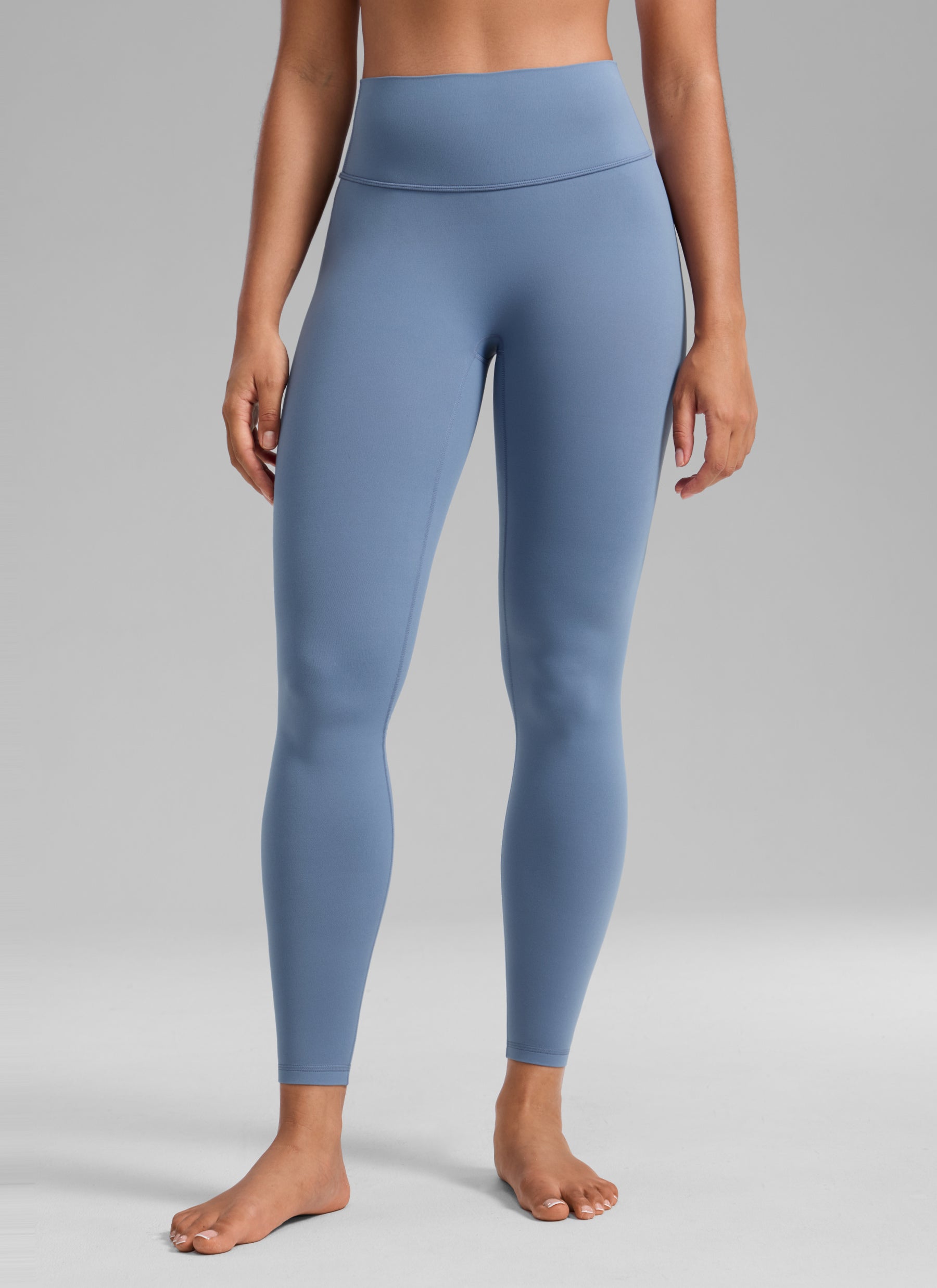 CRZ YOGA Softretch Secretsculpt™ Minor magas derekú, elülső varrásos leggings, mosott farmer