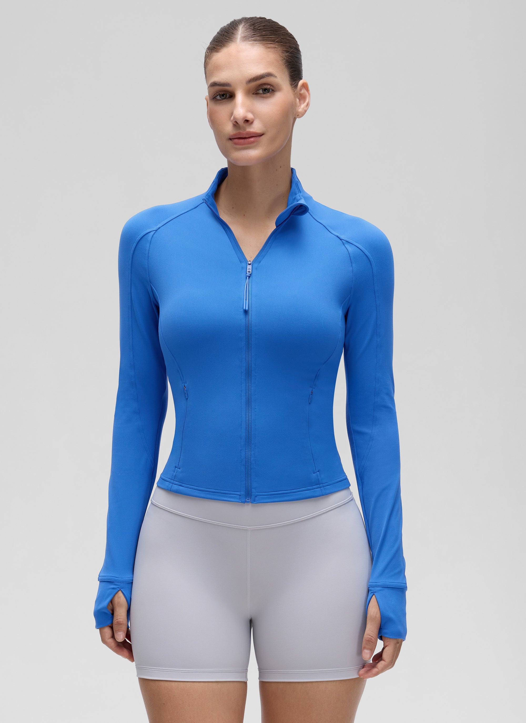Chaqueta corta deportiva de mujer con cremallera completa y bolsillos CRZ YOGA Butterluxe Sparkle Blue