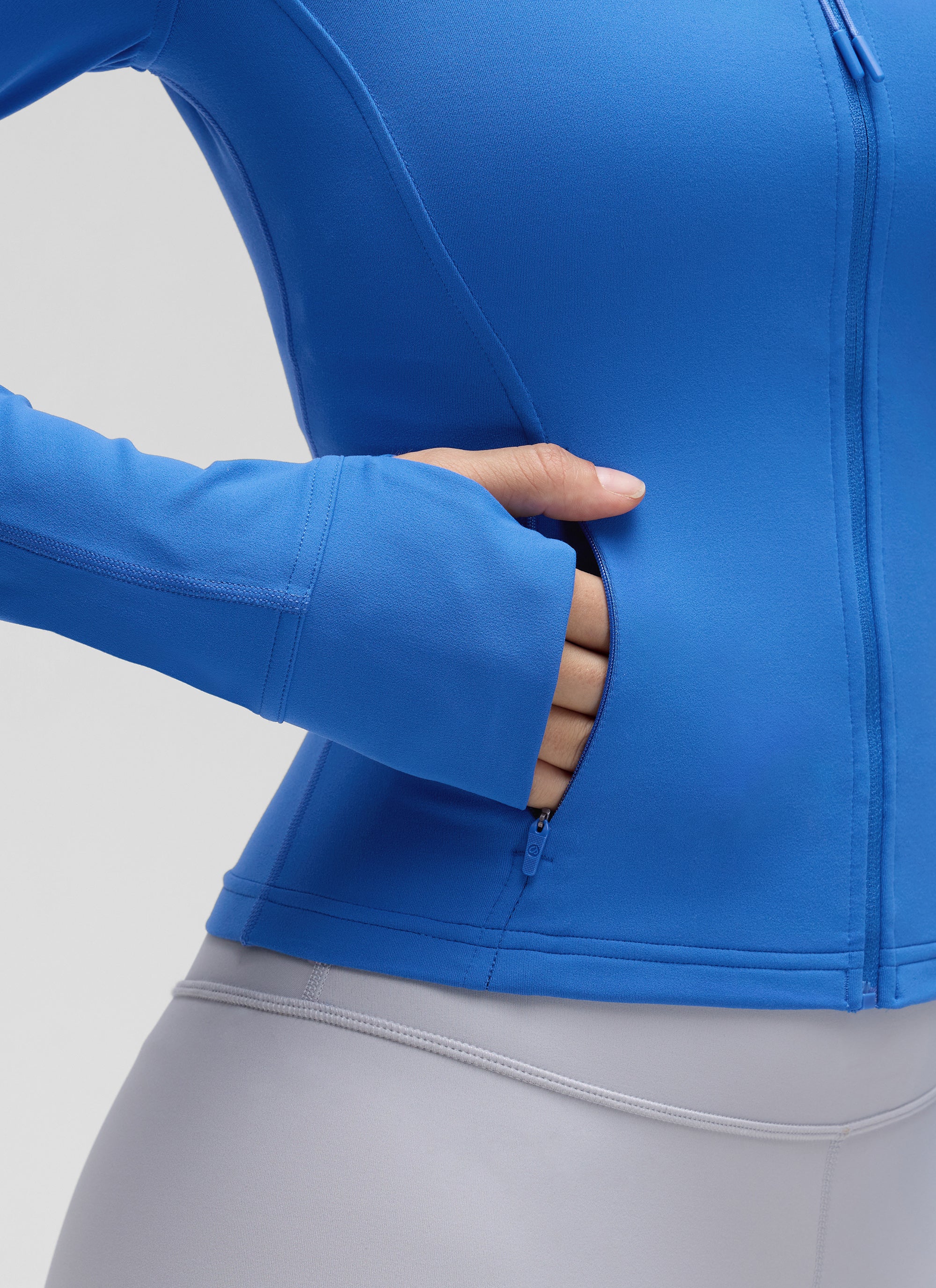 Chaqueta corta deportiva de mujer con cremallera completa y bolsillos CRZ YOGA Butterluxe Sparkle Blue