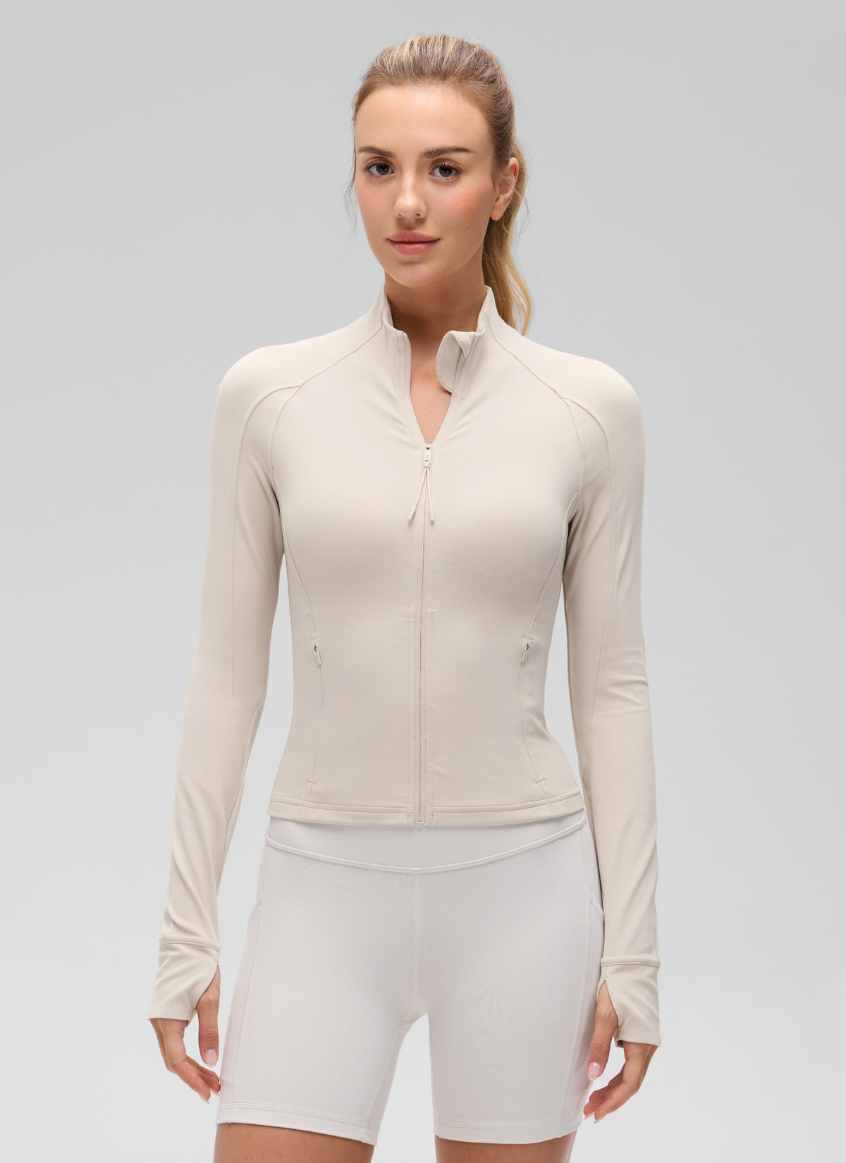 CRZ YOGA Women's Butterluxe Cropped Pocket Outerwear Full Zip Jackets Mojave Tan @model_info:Anna