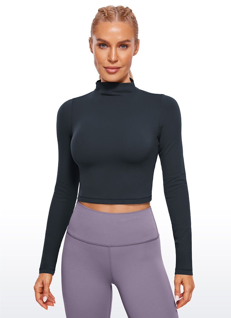 CRZ YOGA Haut de yoga court et ajusté à manches longues et col cheminée Butterluxe pour femme Bleumarine