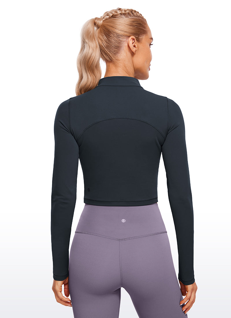 CRZ YOGA Haut de yoga court et ajusté à manches longues et col cheminée Butterluxe pour femme Bleumarine